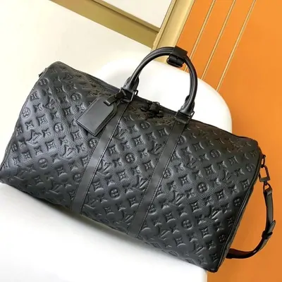 Black embossed travel bag
