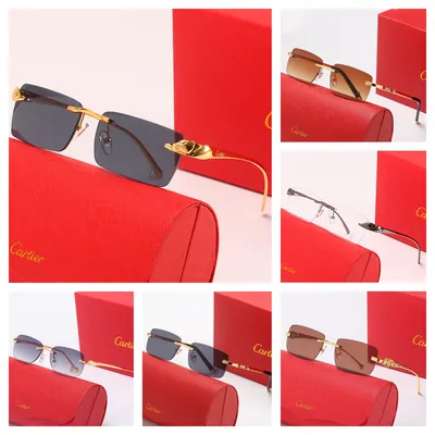 Eyeglasses and sunglasses on red boxes