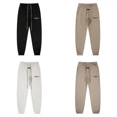 Black, white and beige sweatpants
