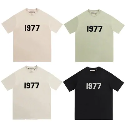 Cream and green graphic T-shirts